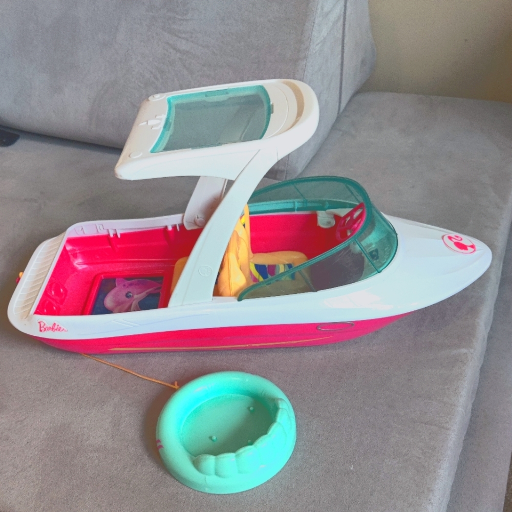 Barbie speedboat actually floats in water